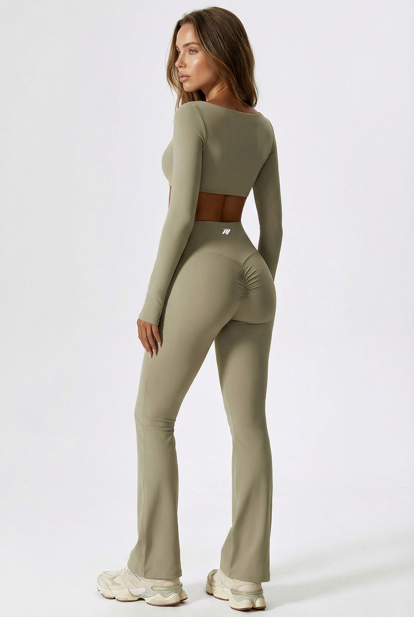 Legging flare donna verde pistachio- vista laterale posteriore